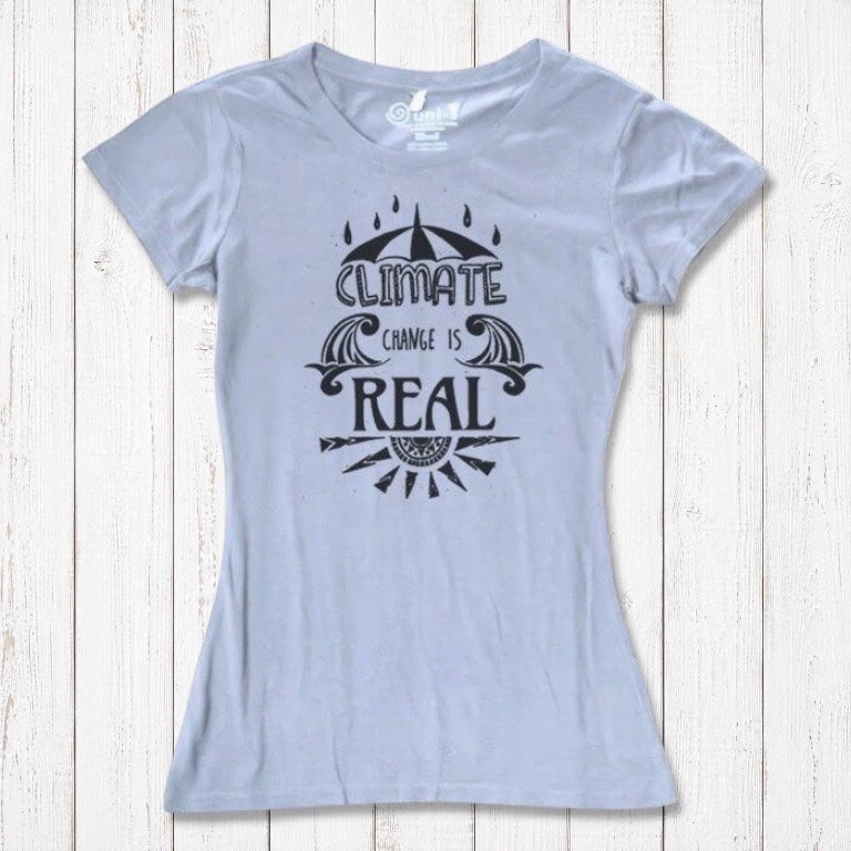 Light blue Women's Climate Change T-Shirt in bamboo & organic cotton, with black 'Climate Change is Real' graphic for eco-conscious shoppers.