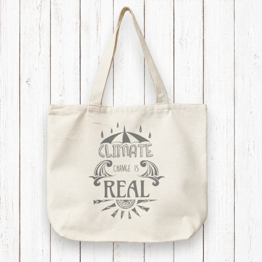 Organic canvas tote bag with 'Climate Change Is Real' artist design, ideal eco gift for climate activists. Durable and sustainable for everyday use.
