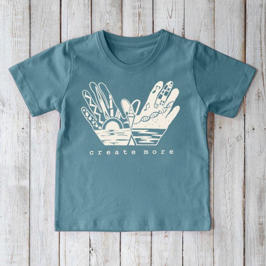 Kids' Creative Art Organic Cotton T-Shirt in blue with 'Create More' hand graphic, eco-friendly inspirational tee by Uni-T for children.