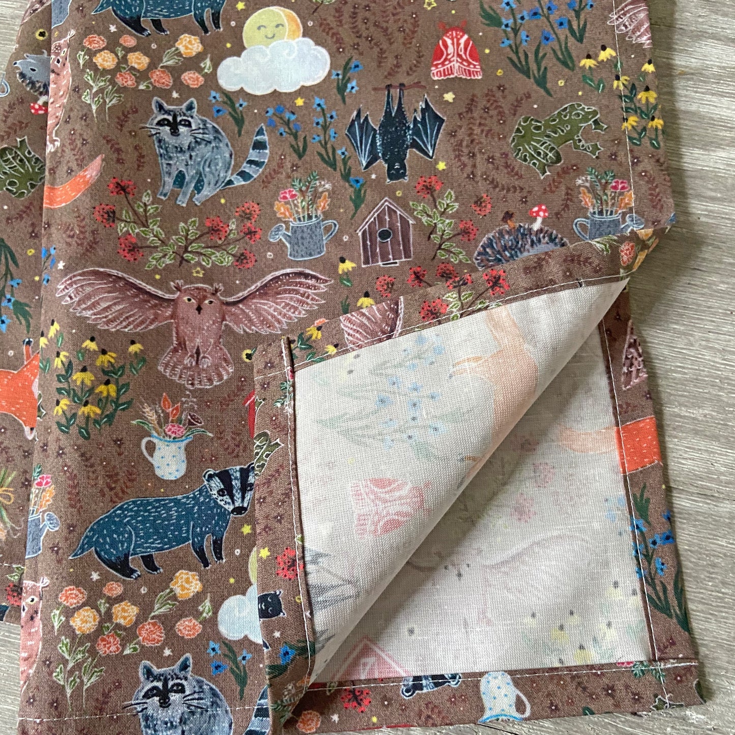 Night animal-themed tea towel with woodland creatures