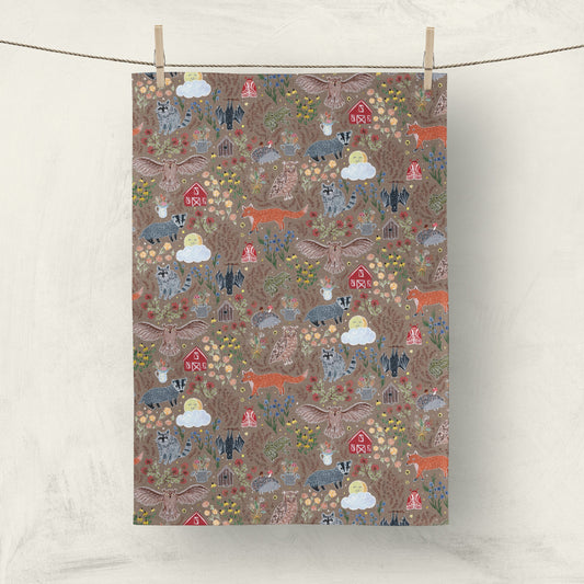Colorful animal print kitchen towel with roosters and chickens