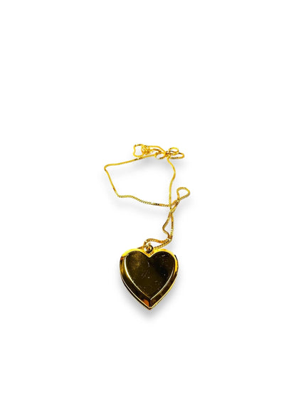 Affordable brass crystal locket in heart shape with a smooth gold-tone finish, ideal for a stylish and meaningful jewelry gift.
