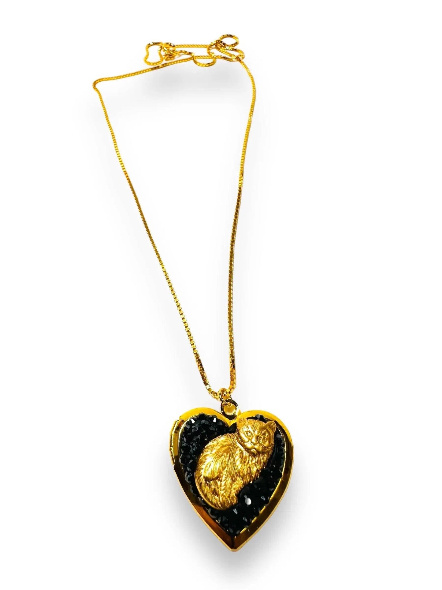 Affordable brass crystal locket with black crystal clay and a detailed gold cat figure, ideal as a unique cat-themed jewelry gift.