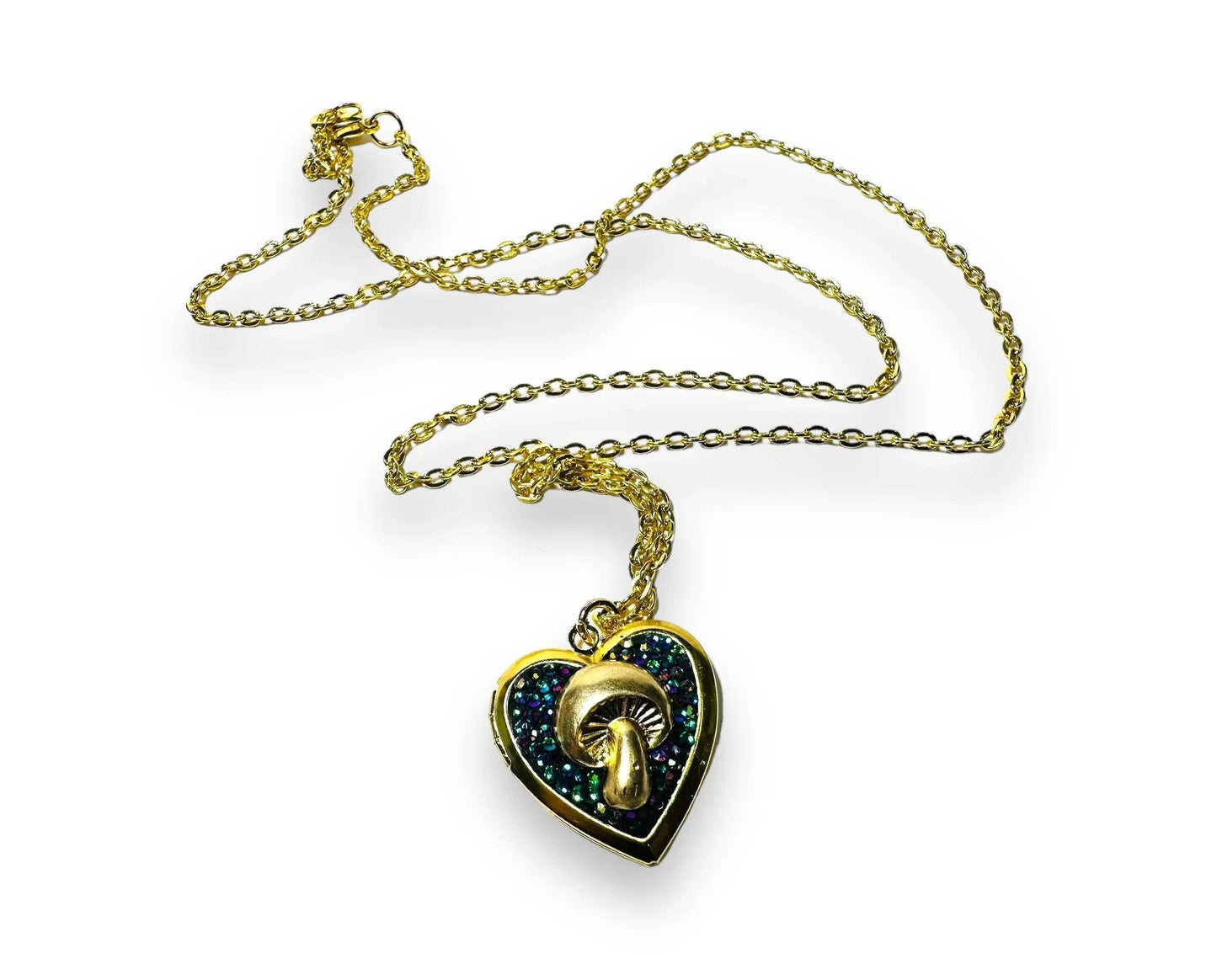 Affordable brass crystal heart locket with mushroom and rainbow crystal clay, ideal for gifting or personal accessories.