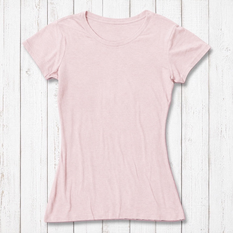 Women's Cubism Face T-Shirt in bamboo and organic cotton in soft pink with white abstract face print. Sustainable art tee for creative women.
