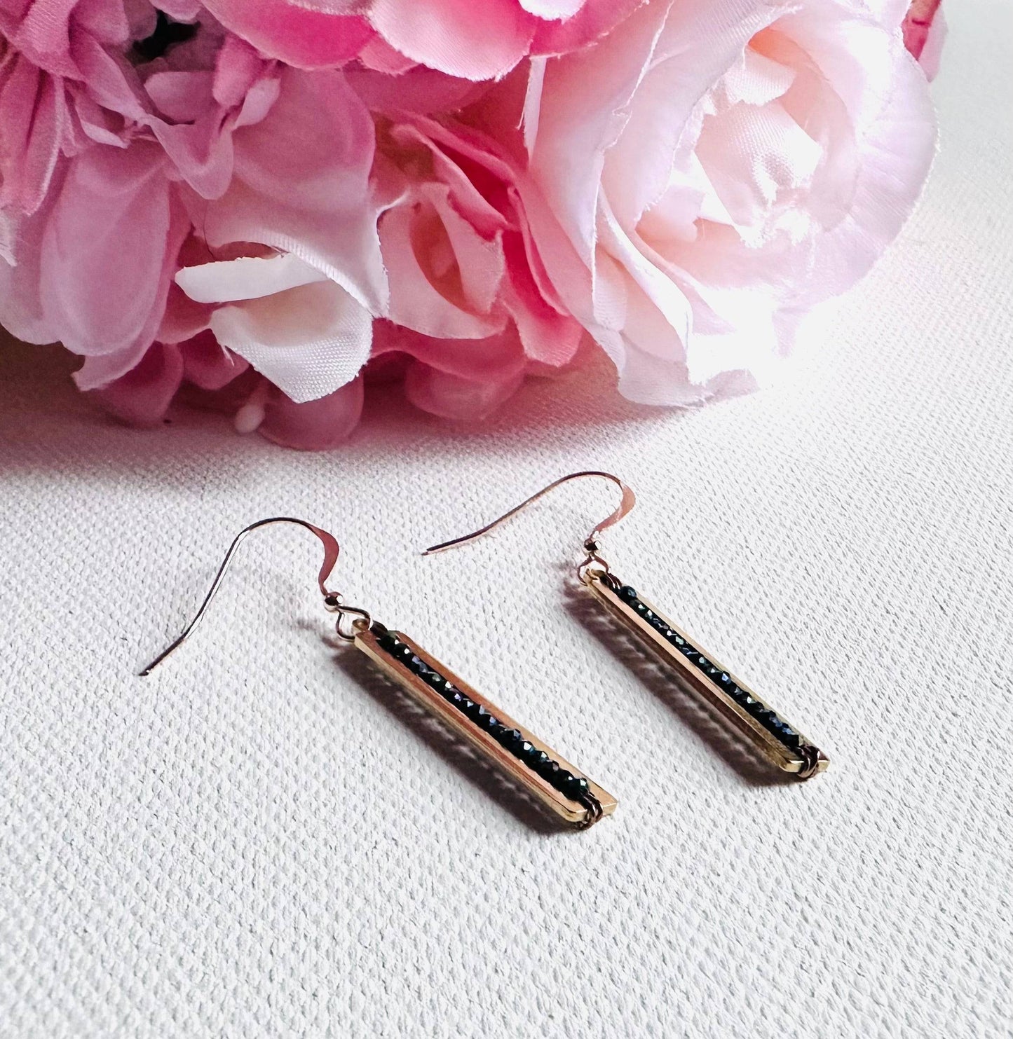 Black Gemstone Bar Earrings-Uni-T with faceted beads in a gold-plated bar. Classic and versatile drop earrings for everyday elegance.