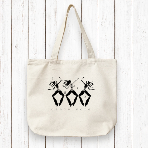 Organic Dance Tote Bag with black artist design of dancers and 'dance more' text. Eco-friendly canvas bag ideal for dance gear or daily use.