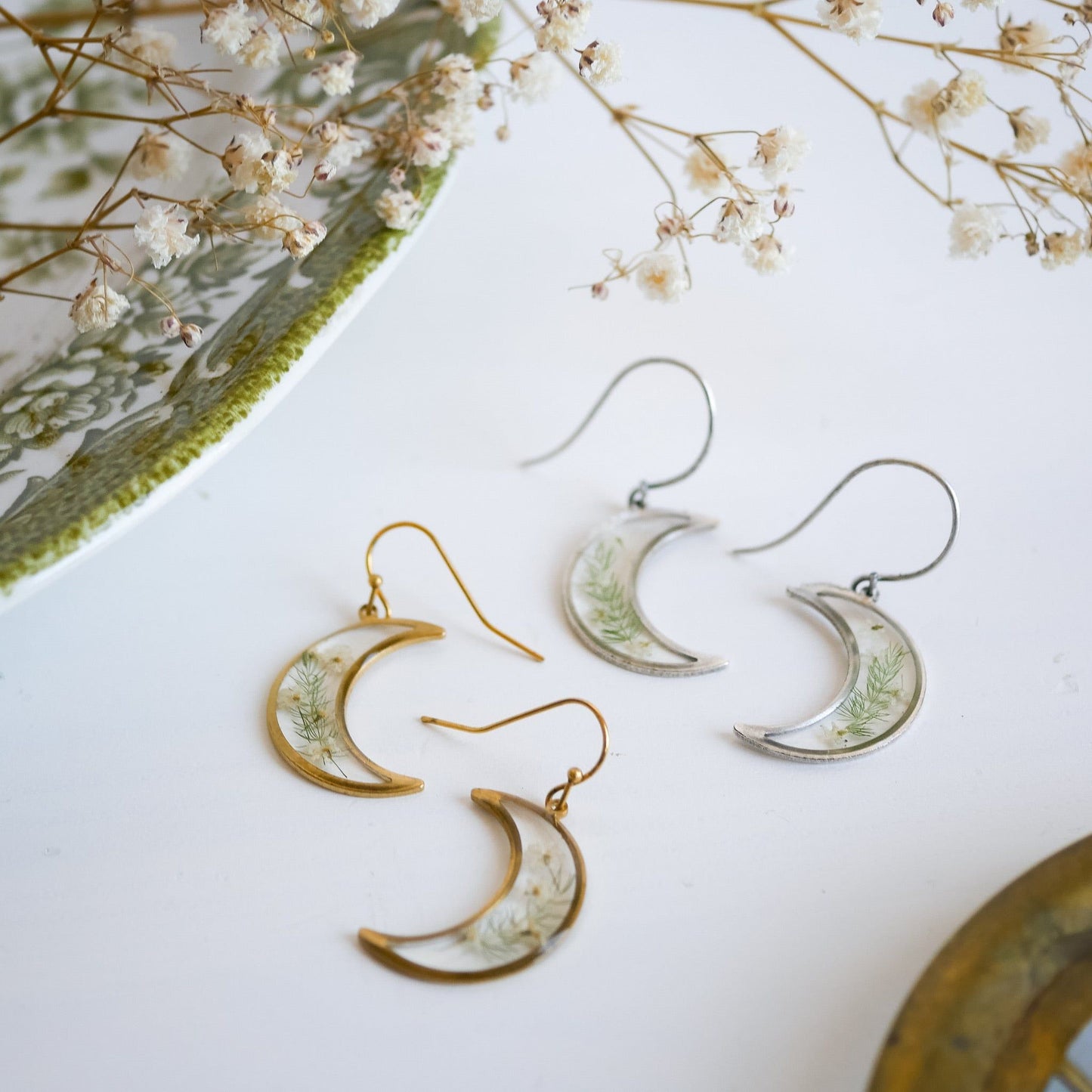 Garden Flower Earrings with Queen Annes Lace in crescent moon shape, available in brass and silver. Nickel free and handcrafted with real flowers.