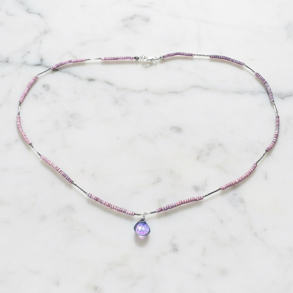Pink and purple beaded jewelry with gemstone pendant