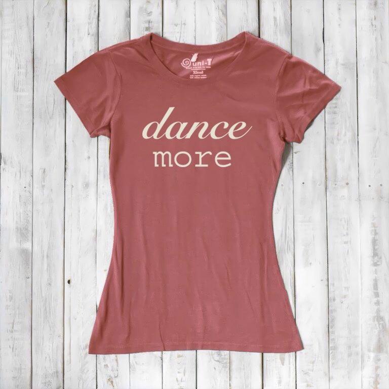 Terra cotta Women's Dance T-Shirt made of bamboo & organic cotton with 'dance more' slogan. Perfect for dancers seeking comfort and style.