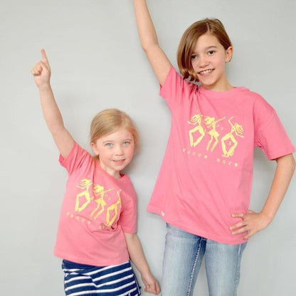 Two children wearing pink 'Dance More' organic cotton t-shirts by Uni-T, showcasing fun, active lifestyle apparel for kids.