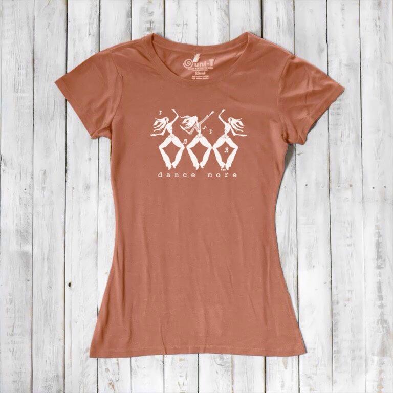 Rust-colored Women's Dance T-Shirt in Bamboo & Organic Cotton with white 'Dance More' graphic, perfect for dancers and eco-conscious shoppers.