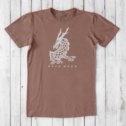 Rust brown men's bamboo and organic cotton t-shirt with white dragon design and 'Dare More' text, eco-friendly fantasy art tee.