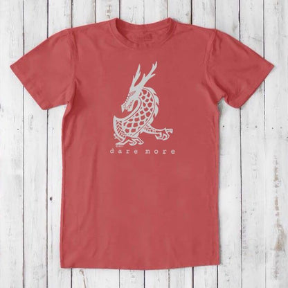Coral red men's bamboo and organic cotton t-shirt with white dragon illustration and 'Dare More' text, fantasy adventure graphic tee.