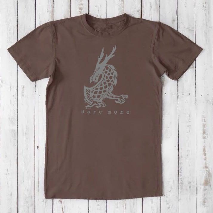 Chocolate brown men's bamboo and organic cotton t-shirt with grey dragon graphic and 'Dare More' text, fantasy-themed eco tee.