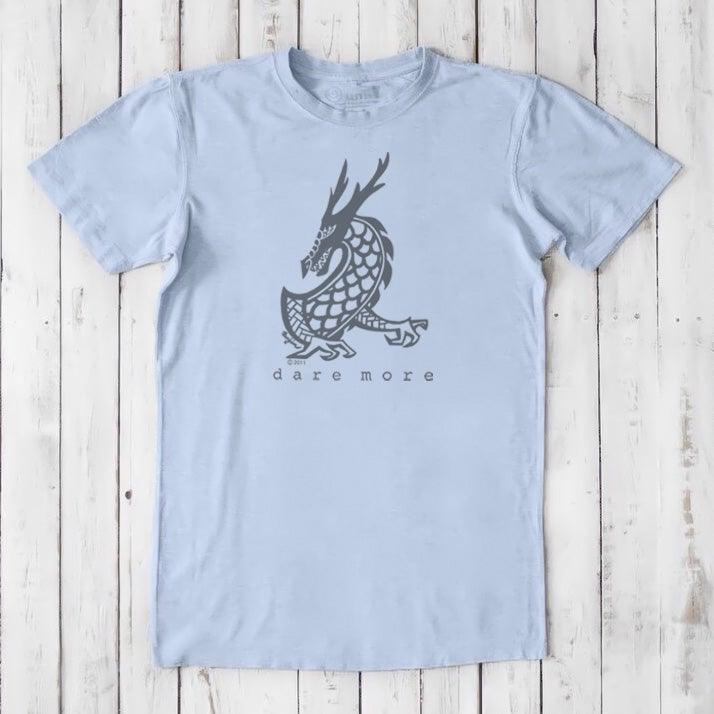 Light blue men's dragon t-shirt in bamboo and organic cotton with grey dragon artwork and 'Dare More' slogan, sustainable fantasy tee.