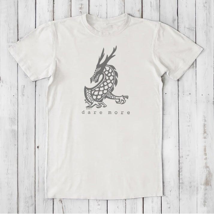 White men's bamboo and organic cotton t-shirt with grey dragon graphic and 'Dare More' text, fantasy art tee for adventurous men.