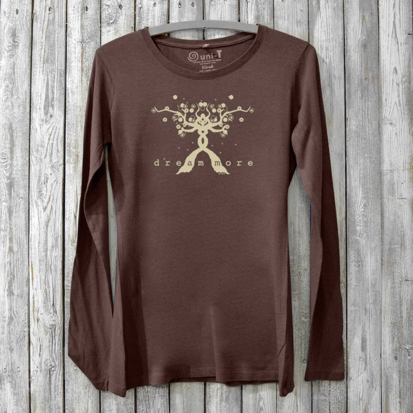 Eco-friendly women's long sleeve graphic tee in brown featuring 'Dream More' tree design, crafted from bamboo and organic cotton.