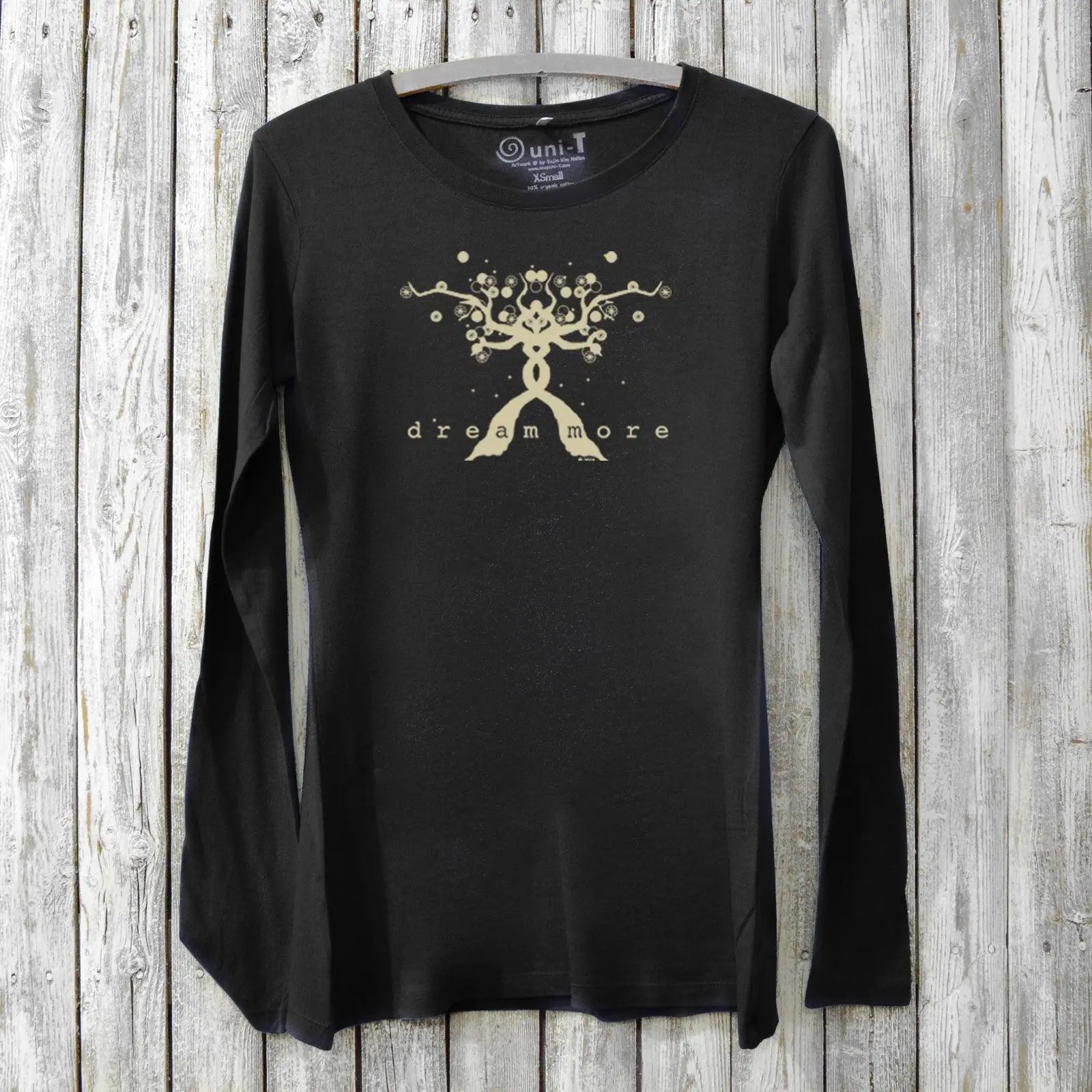 Black bamboo and organic cotton long sleeve shirt for women with inspirational 'Dream More' tree print, ideal for casual winter wear.
