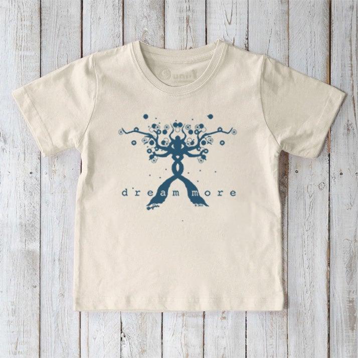 Kids' Positive Message Organic Cotton T-Shirt in cream with blue 'Dream More' graphic. Eco-friendly inspirational tee by Uni-T for children.