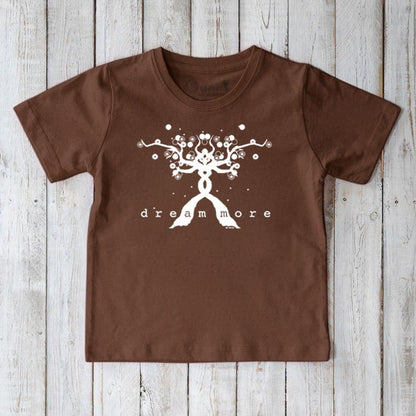 Brown Kids' Organic Cotton T-Shirt featuring white 'Dream More' uplifting graphic. Sustainable motivational shirt for children by Uni-T.