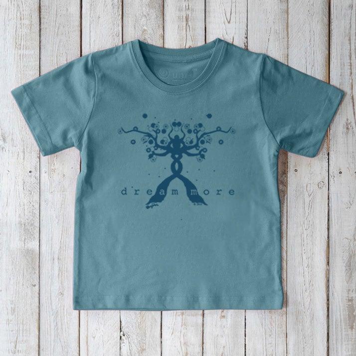 Blue Kids' Organic Cotton T-Shirt with dark blue 'Dream More' motivational design. Sustainable and positive message shirt by Uni-T for kids.