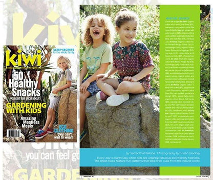 Children modeling Uni-T's eco-friendly Kids' Elephant Organic Cotton T-Shirt in a nature-themed fashion spread, promoting sustainable apparel.