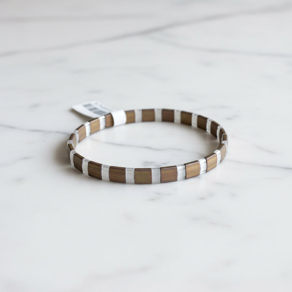 Back view of Flat Tile Bead Stretch Bracelet with tag