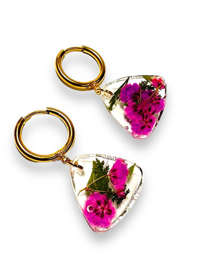 Triangle resin earrings with pink flowers and gold hoops. Unique pressed flower earrings with a geometric design.