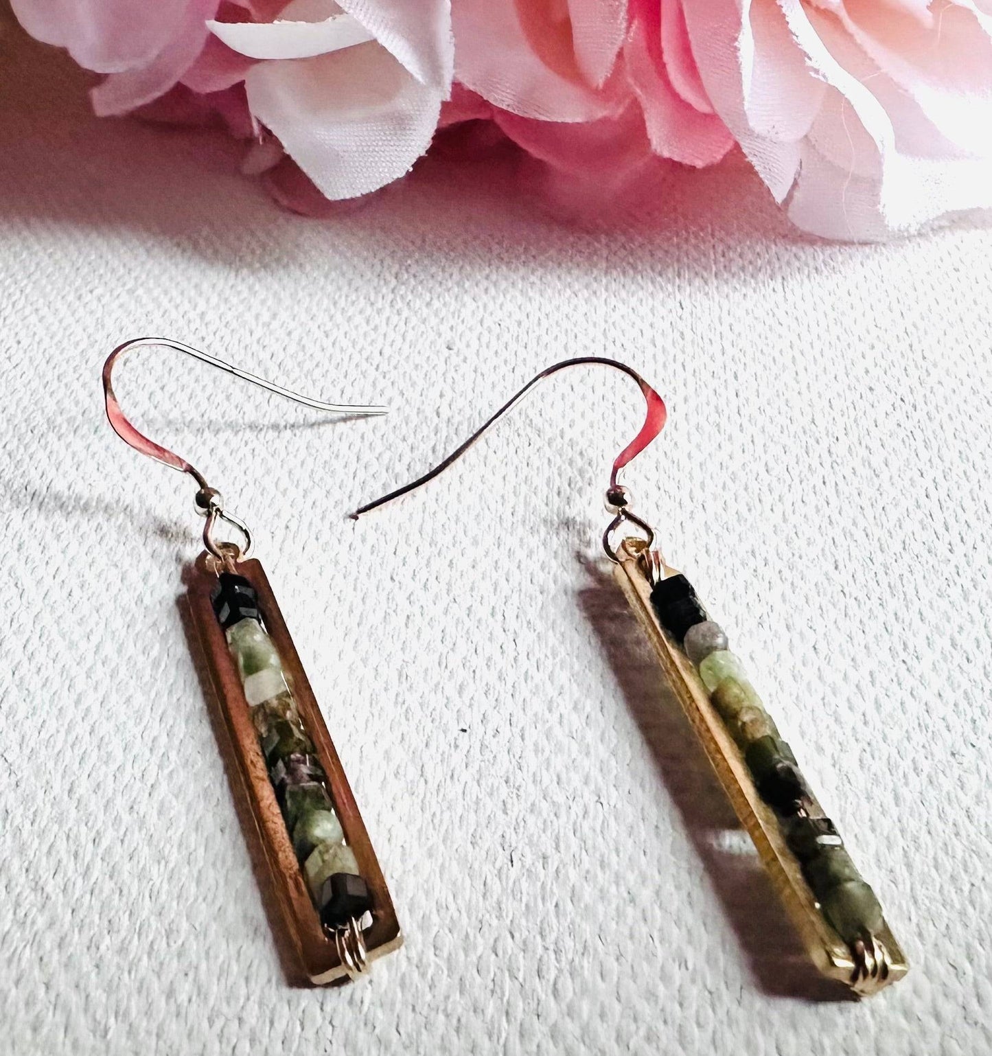Green-toned Gemstone Bar Earrings-Uni-T with mixed natural beads in a gold-plated bar. Unique and earthy style for gemstone jewelry lovers.