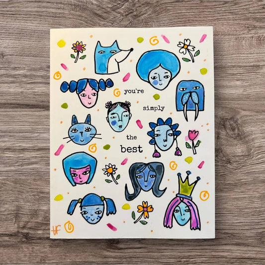 Handmade Friendship Card - Good Vibe Tribe with whimsical blue-toned faces, floral doodles, and 'you're simply the best' message on white background.