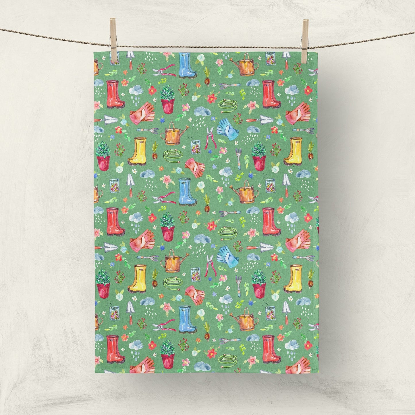 Garden Soul Tea Towel with gardening tools and plants on flowers