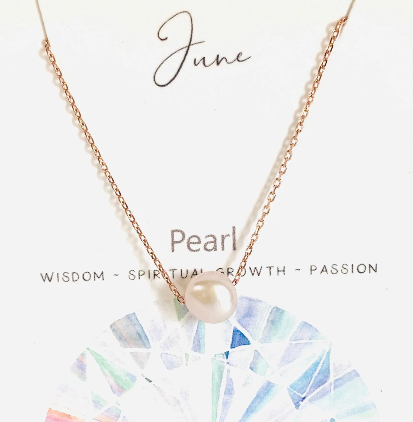 June birthstone necklace featuring a single pearl on rose gold chain, symbolizing wisdom and spiritual growth.