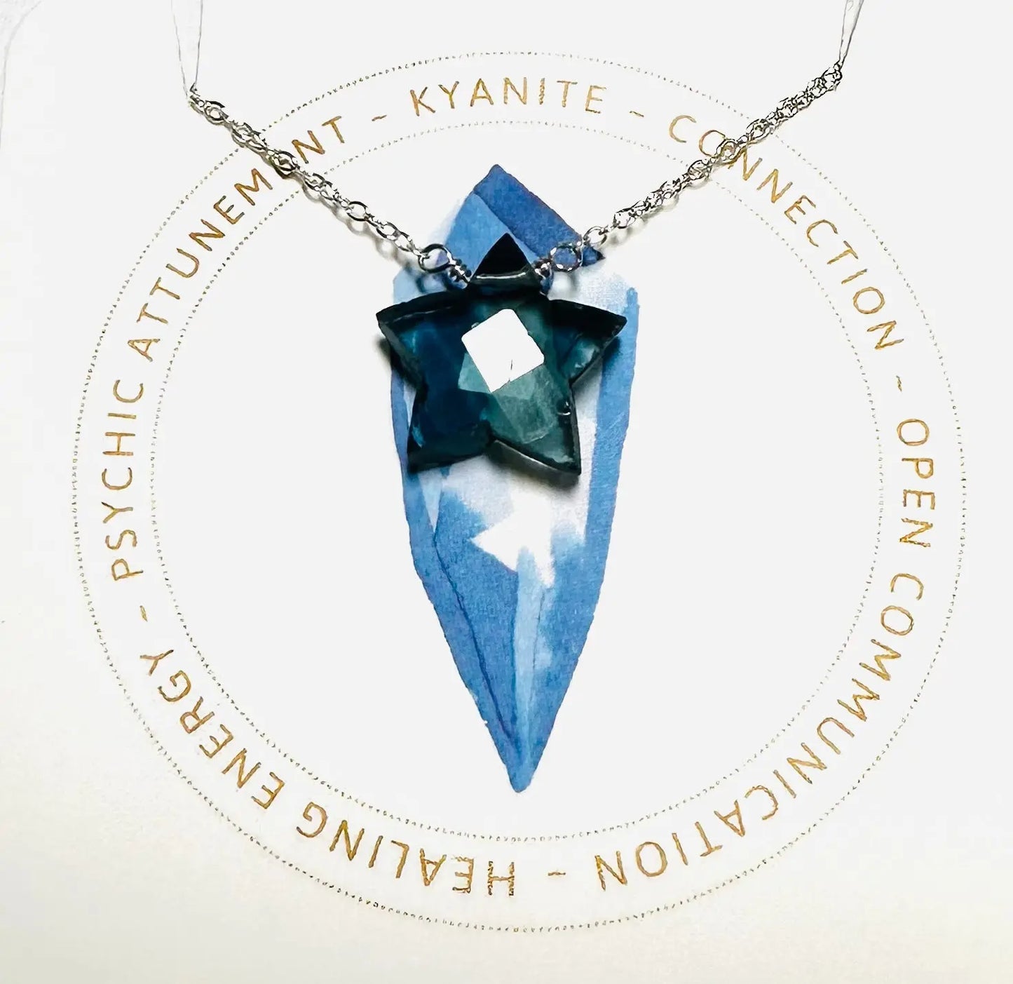 Kyanite star-shaped gemstone necklace on silver chain, promoting psychic attunement and open communication.