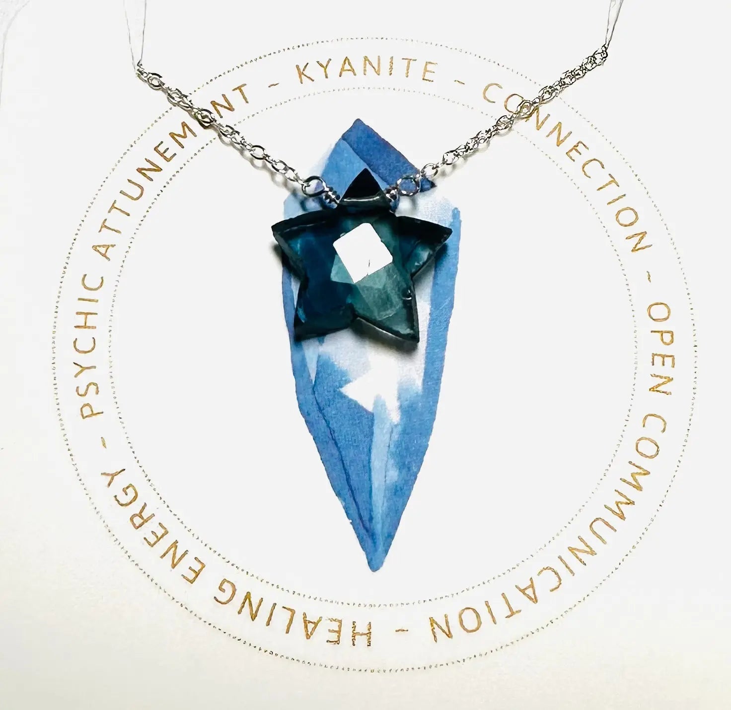 Kyanite star-shaped gemstone necklace on silver chain, promoting psychic attunement and open communication.