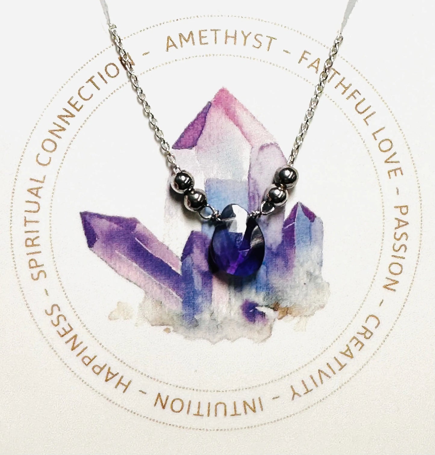 Amethyst gemstone necklace with silver chain and accent beads, handmade for spiritual connection and creativity.
