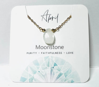April birthstone necklace with moonstone pendant and gold accents, handmade for purity and love.