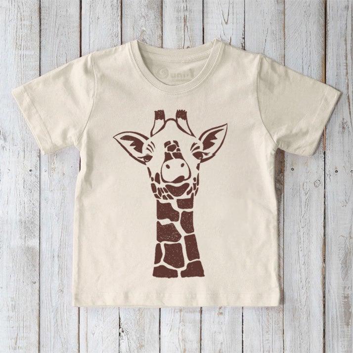 Cream-colored Kids' Giraffe Organic Cotton T-Shirt with brown giraffe design. Eco-conscious wildlife tee by Uni-T for young animal lovers.