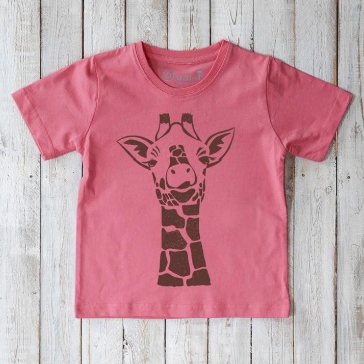 Pink Kids' Giraffe Organic Cotton T-Shirt with brown giraffe illustration. Eco-friendly graphic tee by Uni-T for children who love animals.