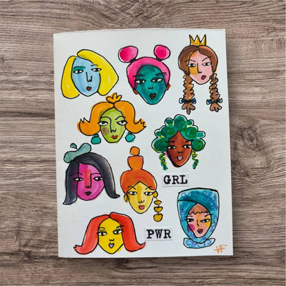 Good Vibe Tribe Girl Power Card with diverse hand-painted female faces and bold 'GRL PWR' text, celebrating empowerment and unity.