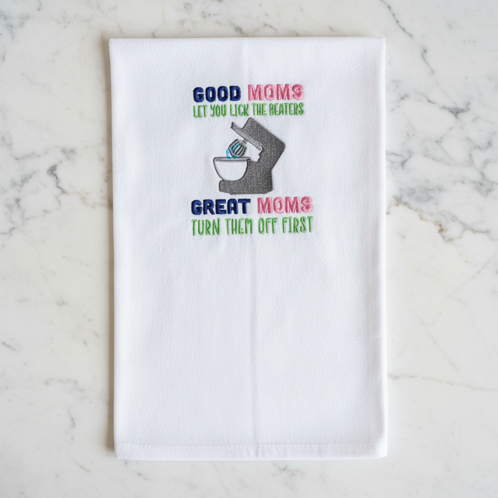 Good moms let you lick the beaters, great moms turn them off first Embroidered Towel