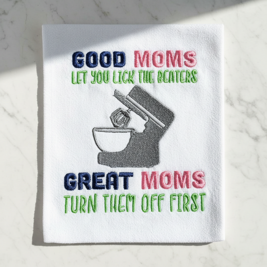 Good moms let you lick the beaters, great moms turn them off first Embroidered Towel