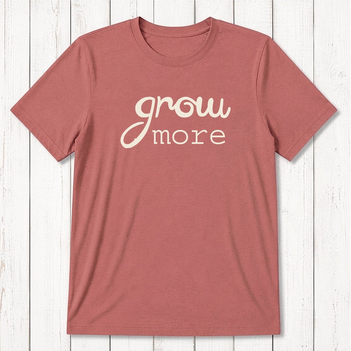 Rust red 'Grow More' men's bamboo and organic cotton T-shirt, classic fit graphic tee for gardening and plant enthusiasts.
