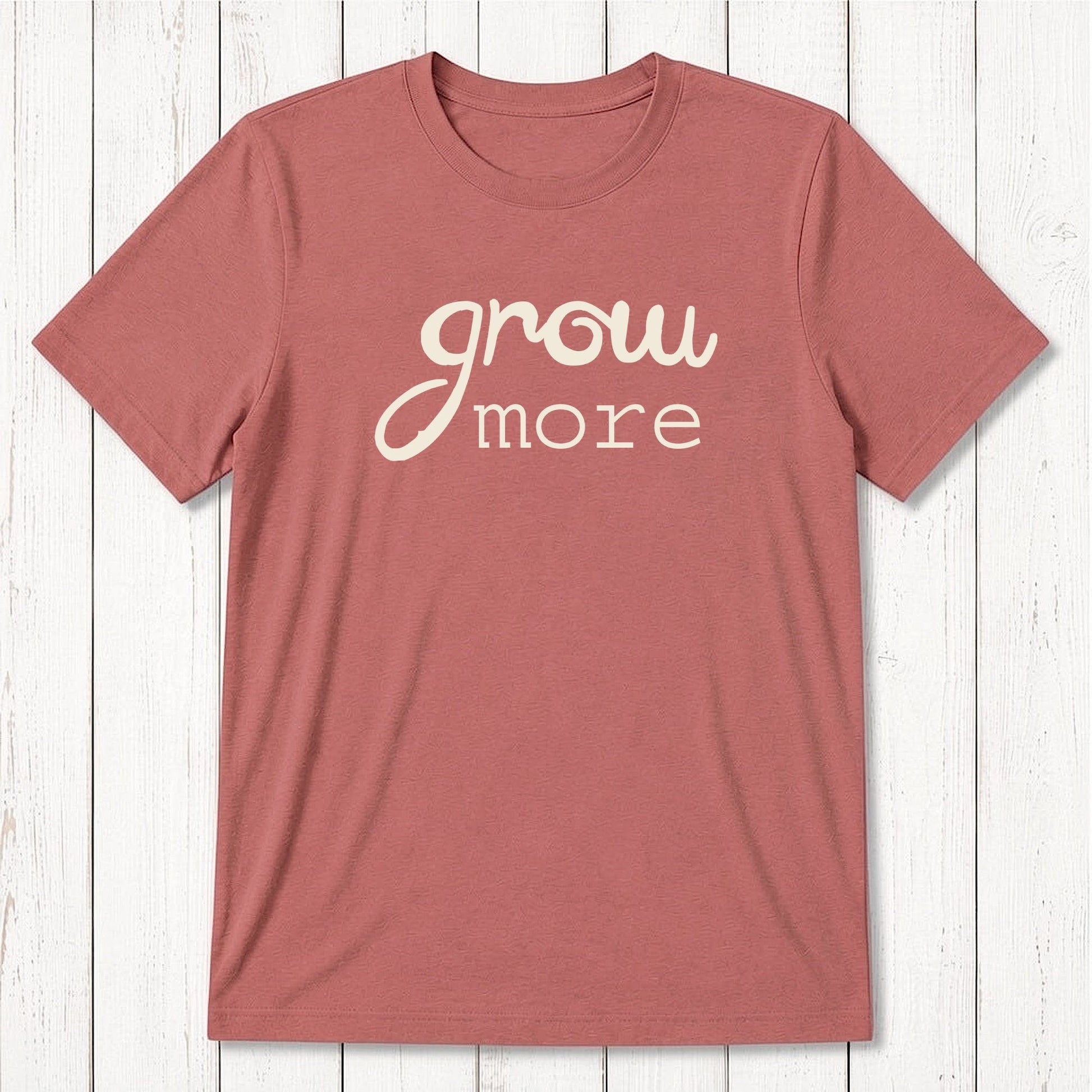 Rust red 'Grow More' men's bamboo and organic cotton T-shirt, classic fit graphic tee for gardening and plant enthusiasts.