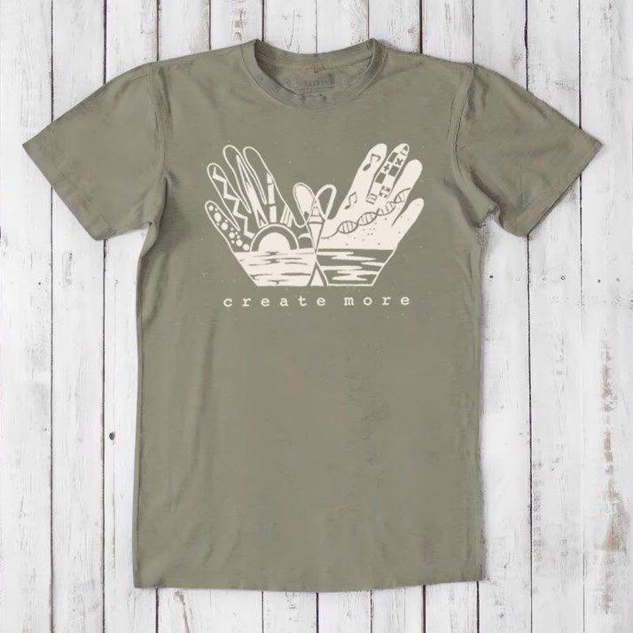 Olive green Men's Hand Art T-Shirt in Bamboo & Organic Cotton with cream 'Create More' graphic. Sustainable gift tee for creative men.