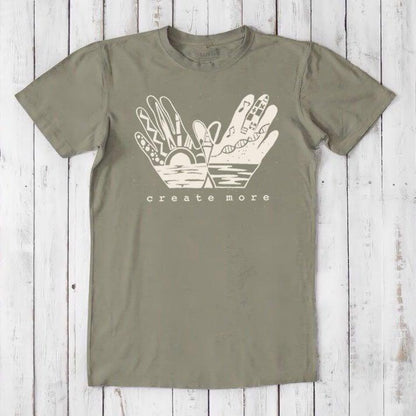 Olive green Men's Hand Art T-Shirt in Bamboo & Organic Cotton with cream 'Create More' graphic. Sustainable gift tee for creative men.
