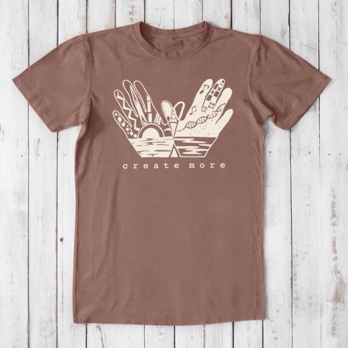 Brown Men's Hand Art T-Shirt in Bamboo & Organic Cotton with cream 'Create More' graphic. Eco-friendly apparel for artists.