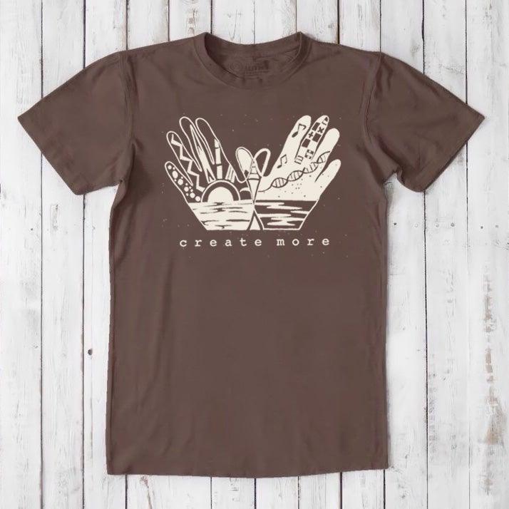 Dark brown Men's Hand Art T-Shirt in Bamboo & Organic Cotton with cream 'Create More' graphic. Classic fit for eco-conscious artists.