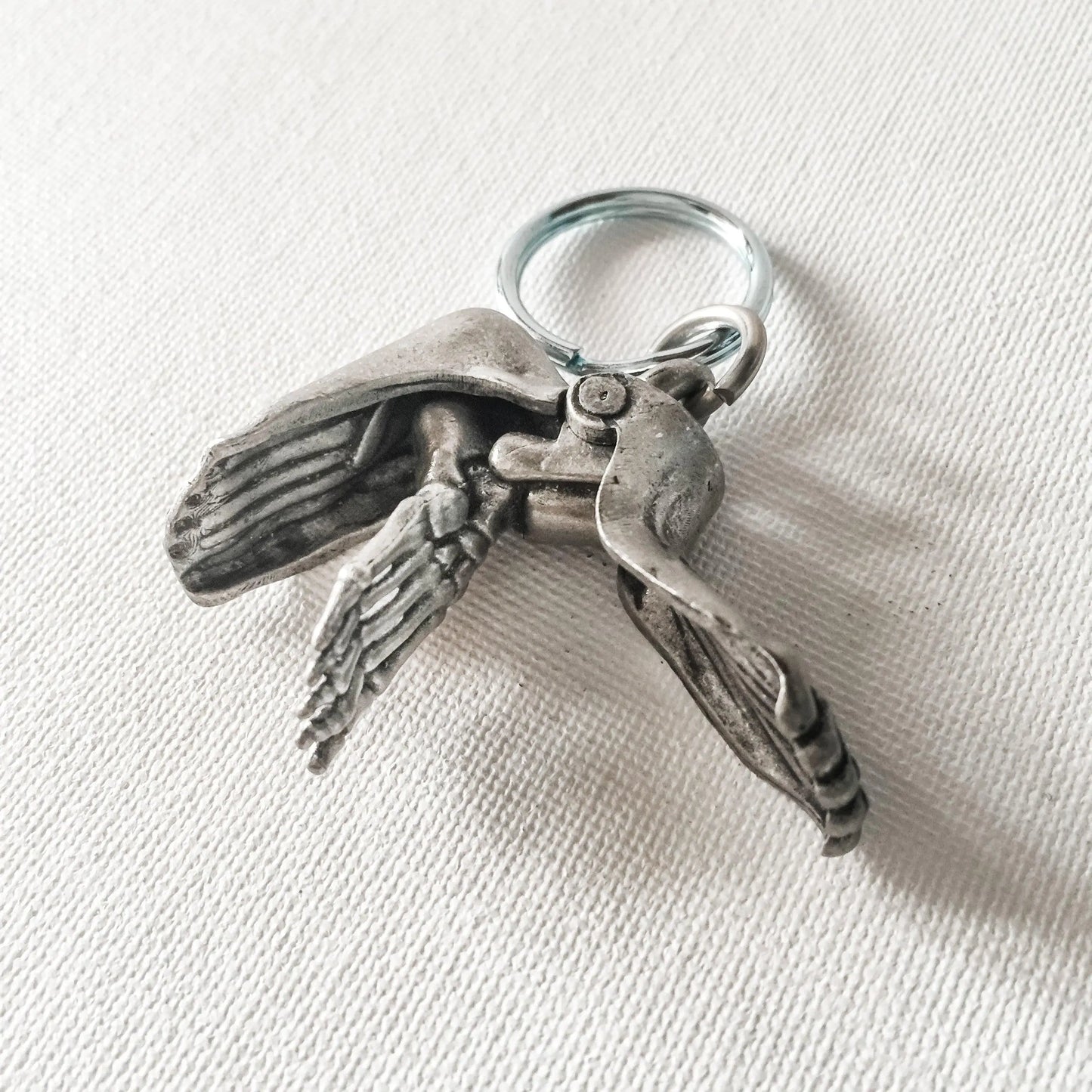 Foldable Human Foot Keychain showing internal skeletal and muscular anatomy. Compact and educational gift for anatomy fans.