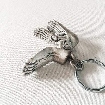 Detailed Human Foot Keychain with movable parts displaying anatomical layers. Great novelty gift for science and anatomy lovers.
